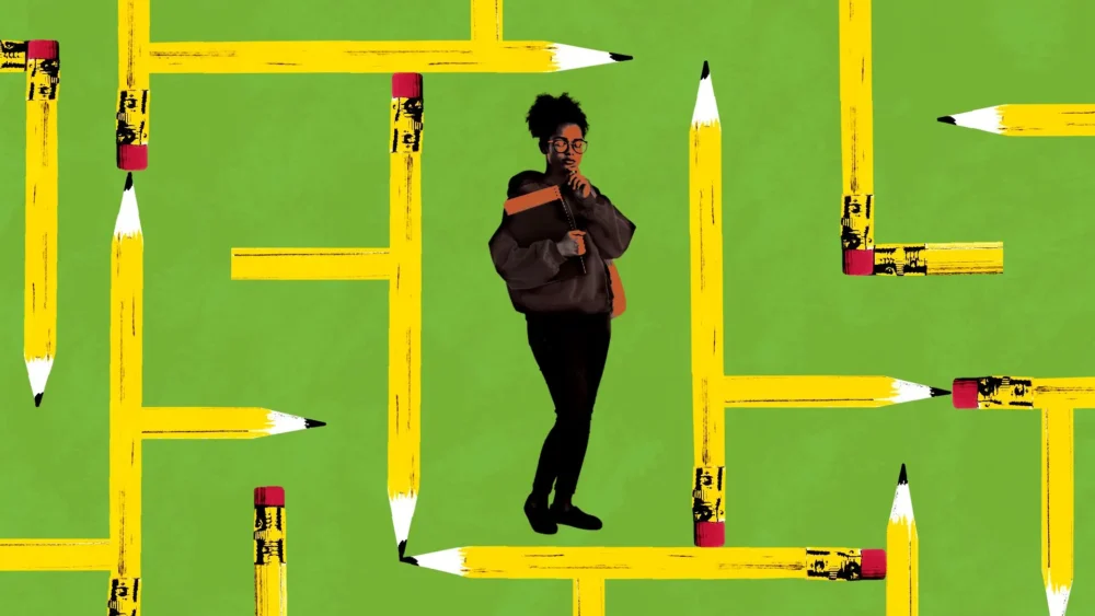 Image of a student standing in front of a green background with pencils pointing in different directions all around.