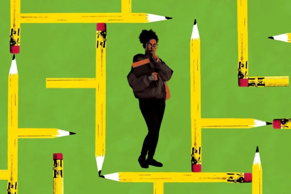 Image of a student standing in front of a green background with pencils pointing in different directions all around.